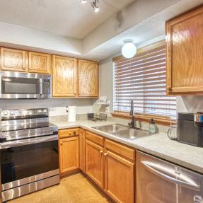 1045 Laramie Blvd Unit F - Stove in kitchen