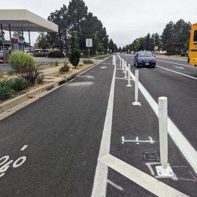 buffered bike lane with flex posts and paint