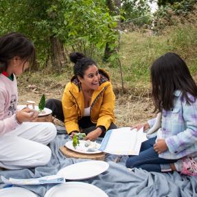 children making art in park