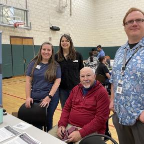 City and partner staff doing outreach for the Community Mediation and Resolution Center programs at the Housing Resource Fair 