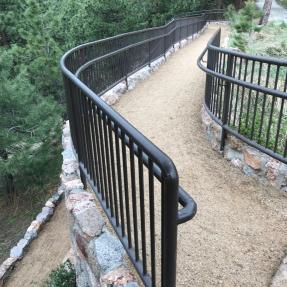 The Sunrise Amphitheater ramp travels away from view, turns and bends back many feet below.