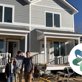 Portrait in front of Ponderosa Habitat home