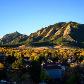 Boulder's Flatirons with fall foliage