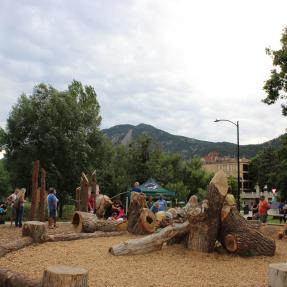 families playing in Wild Woods Discovery Area found in Boulder Creek Park