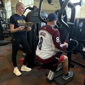 An EXPAND participant uses the weigh machines