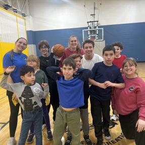 EXPAND Youth pose for a photo after basketball practice